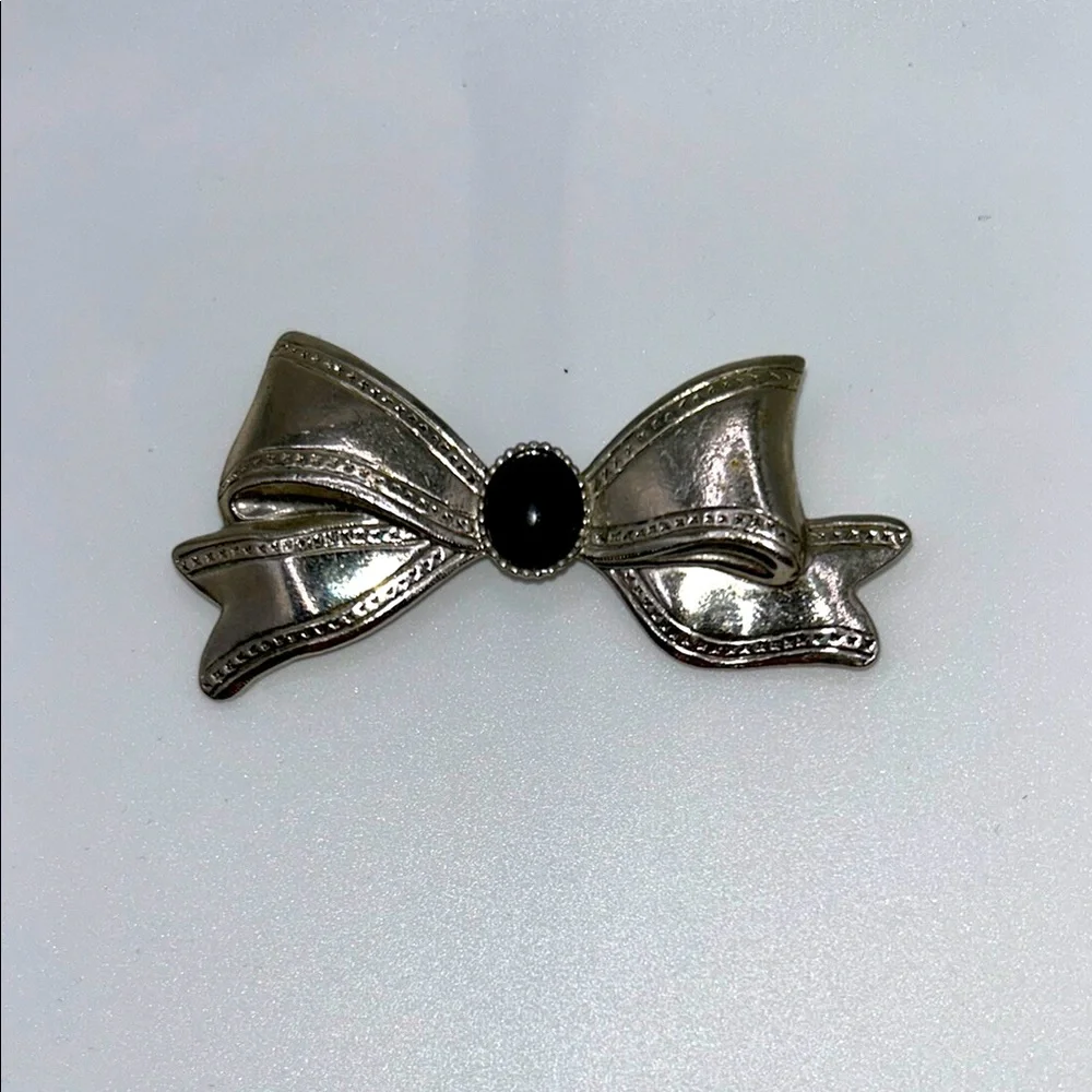 Silver Tone Bow Brooch with Black Center